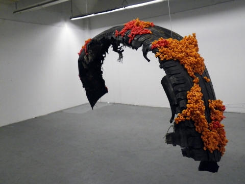 Whale sculpture. tire, froot loops, bleach