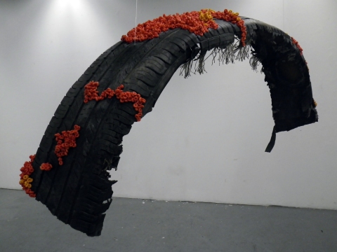 Whale sculpture. tire, froot loops, bleach
