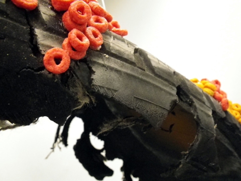 Whale (detail) sculpture. tire, froot loops, bleach