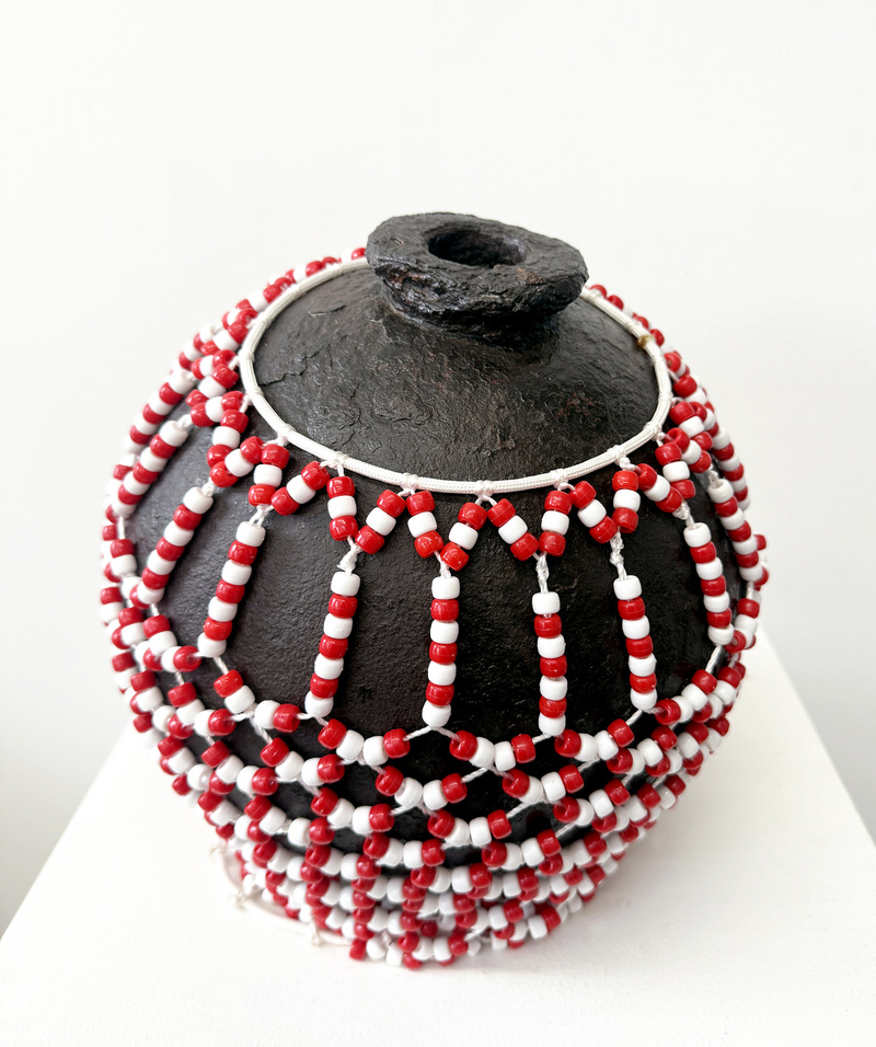 Shekere pa' Santa Bárbara Miguel Luciano Shekere Iron Cannonball (c.17th century, Puerto Rico), beads