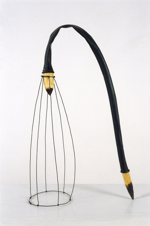  Pam J. Brown Sculpture 14 ga. steel wire, 24 ga. steel wire, wood, rubber bicycle inner tube.
