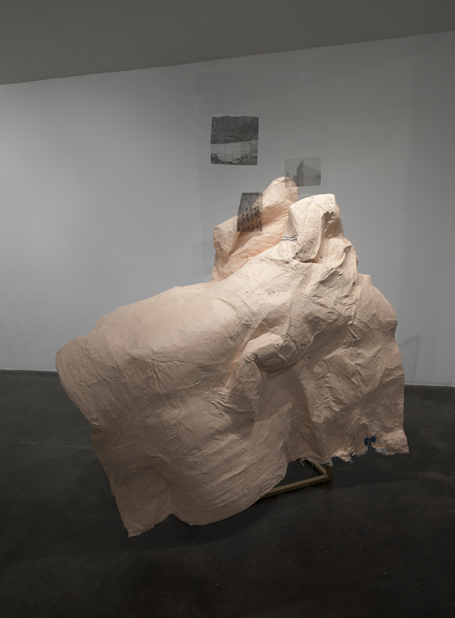 Bessie Kunath The Consequences of Leaning/Sloping Paper maché, plaster, chicken wire, cheesecloth, latex paint, wood, acrylic, acetate, steel, spray paint, ink, found and photographed imagery