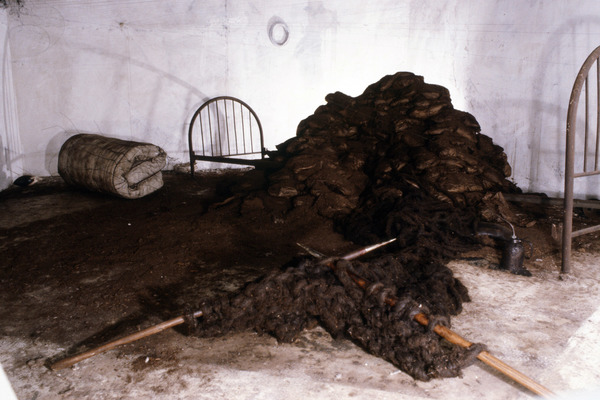 Janice Redman: Sculptor  Early Installations Mixed media with oiled oakum roping, knitted, earth wrapped in oiled paper.