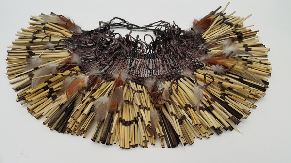 Michelle Mayn 2017 - Shimmer Dried and Rolled Harakeke/NZ Flax, Muka (NZ Flax fibre). Polyurethane coated cotton, Stainless Steel wire, feather, wooden and bone beads
