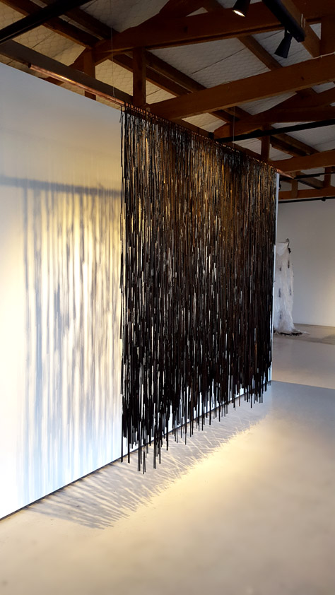 Michelle Mayn Play of Light (2017) Harakeke (NZ Flax/phormium tenax), commercial dye, copper pipe