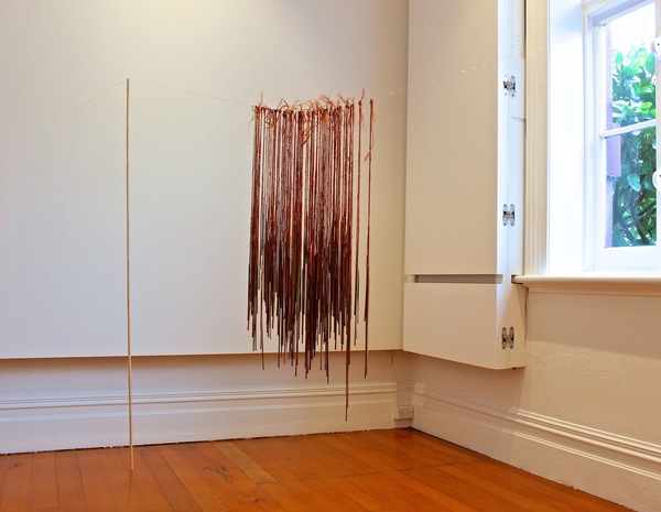 Michelle Mayn Breaking Point II (2019) Muka aho/thread (NZ Flax fibre), pokinikini (tags), hand-whittled pine. Dyed with Tanekaha bark