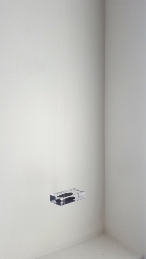 Michelle Mayn 2018 - A Light Reflection Riverstone, perspex, water, nylon thread